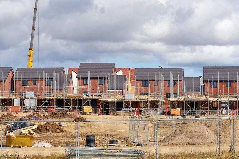 A view of a 5 houses being built on a development