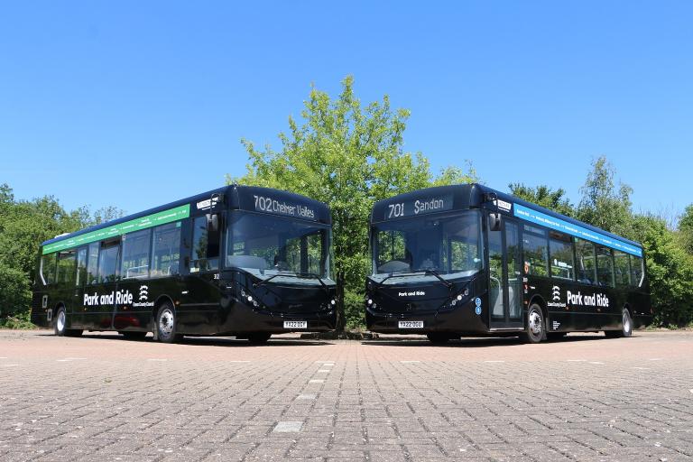 Two black Essex Park and Ride buses parked next to each other.