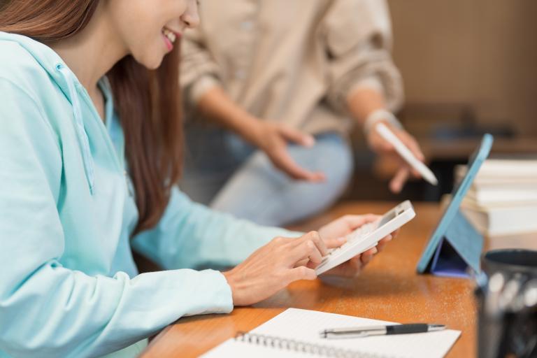 woman using a calculator