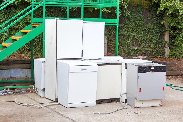 Discarded Dishwashers at local recycling centre.