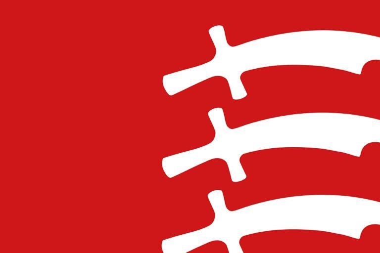 The three seaxes of Essex in white against a red background.
