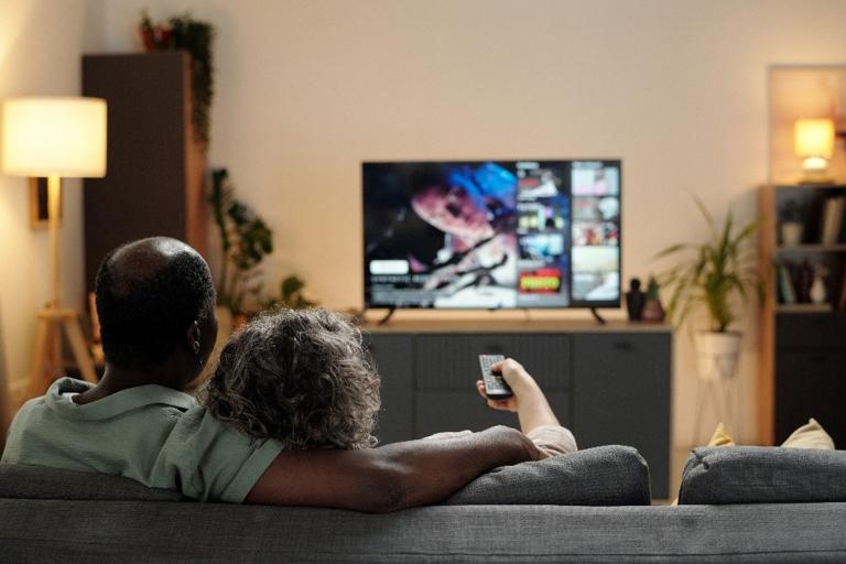 A couple watching television